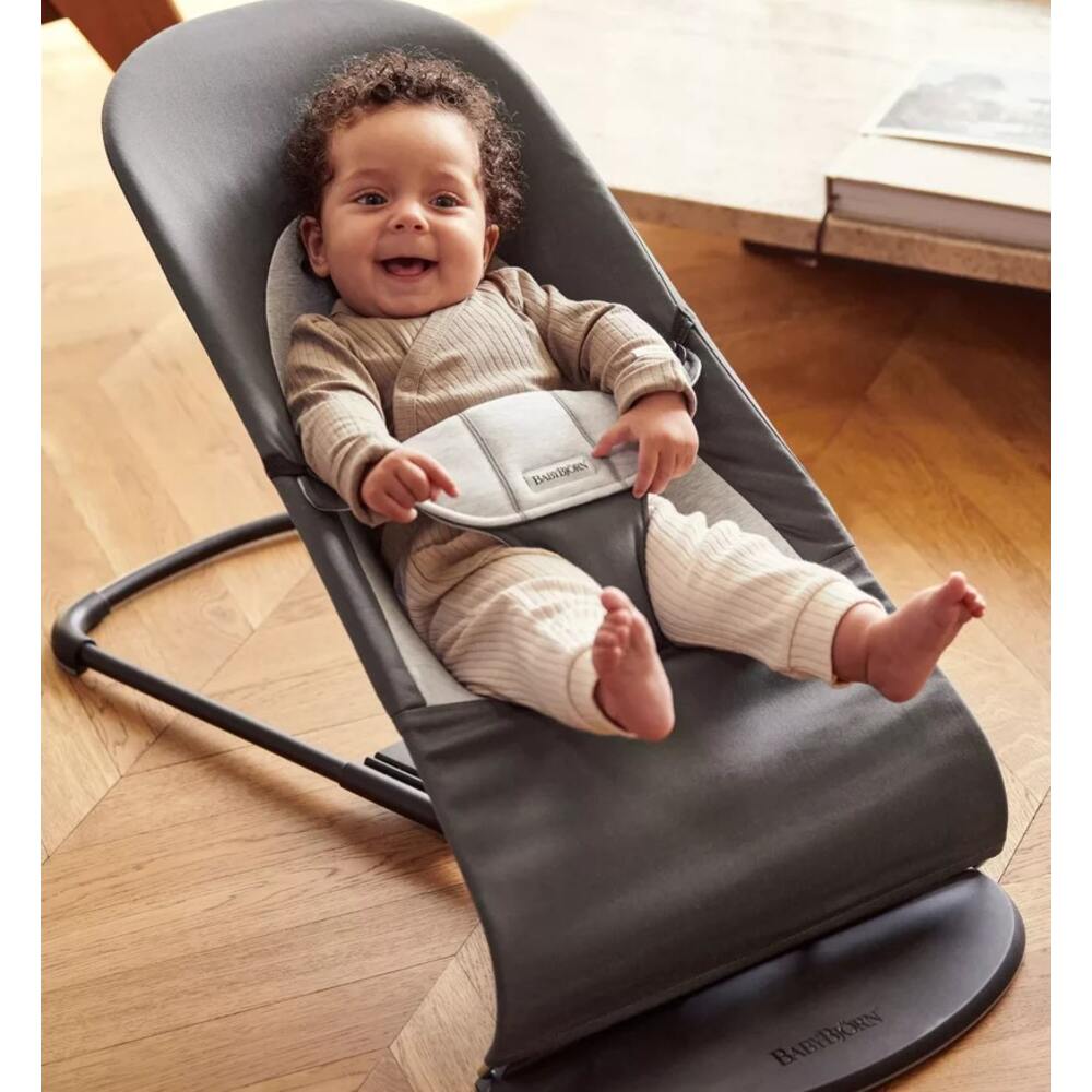 Baby happily sitting in Baby Bjorn bouncer