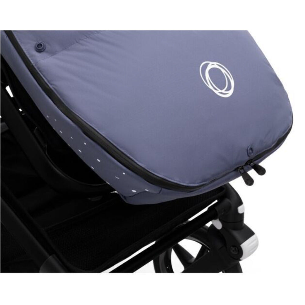 Bugaboo universal footmuff in seaside blue showing the reflective points
