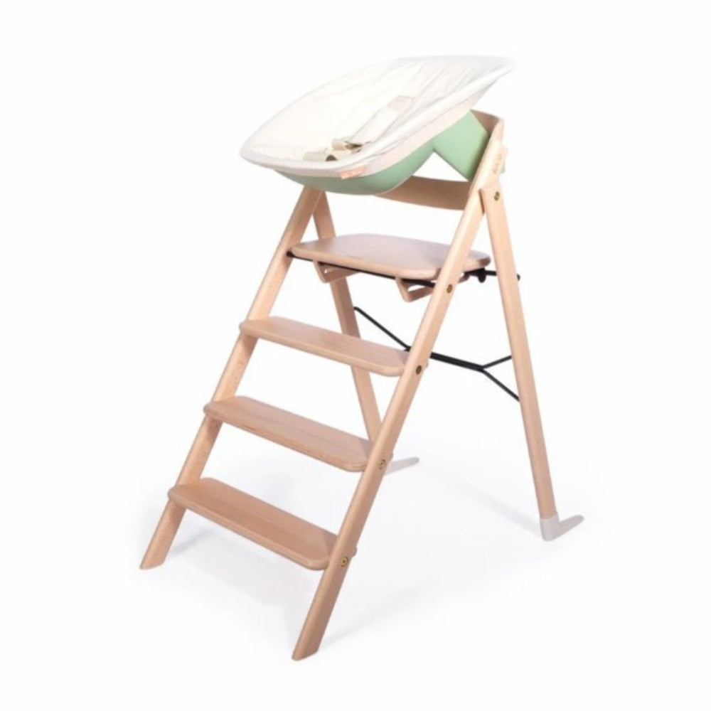 Klapp Newborn Set with Wooden Klapp High Chair with Fishnet green seat.