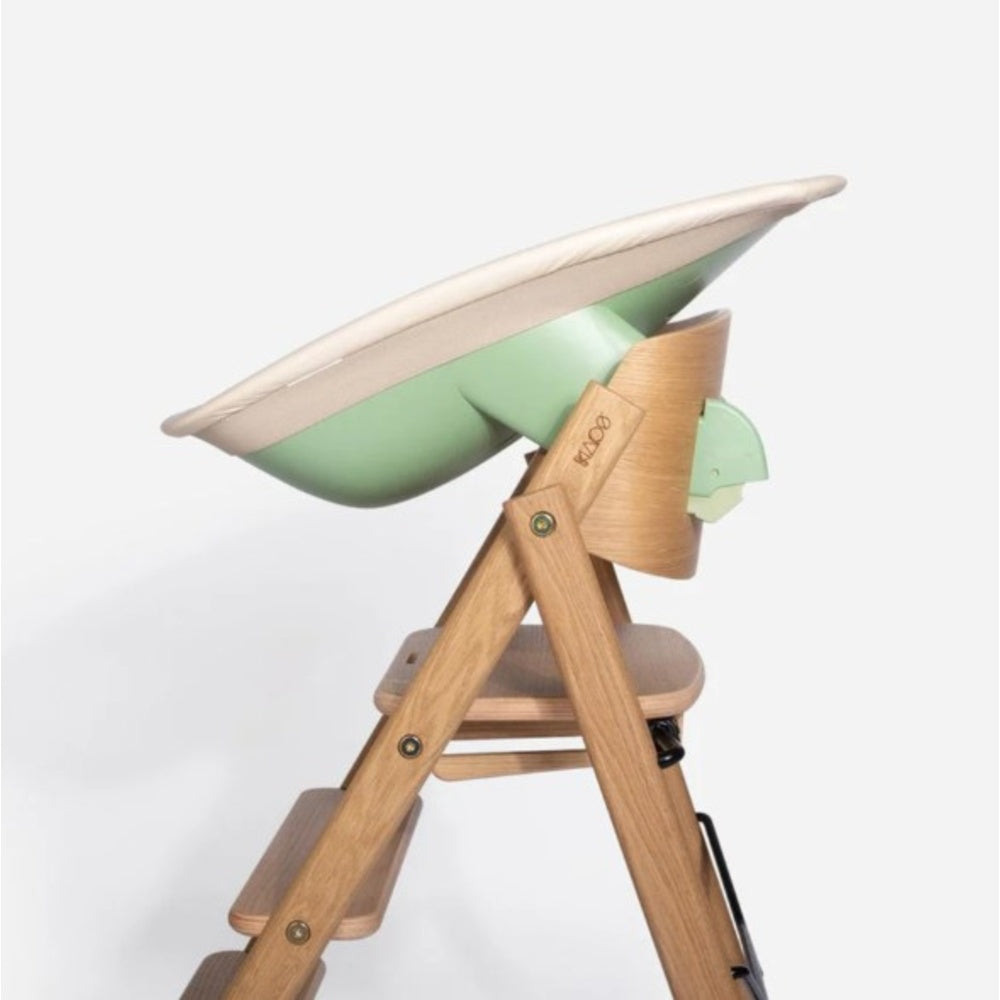 Klapp Newborn Set high chair with Fishnet Green seat and wooden legs