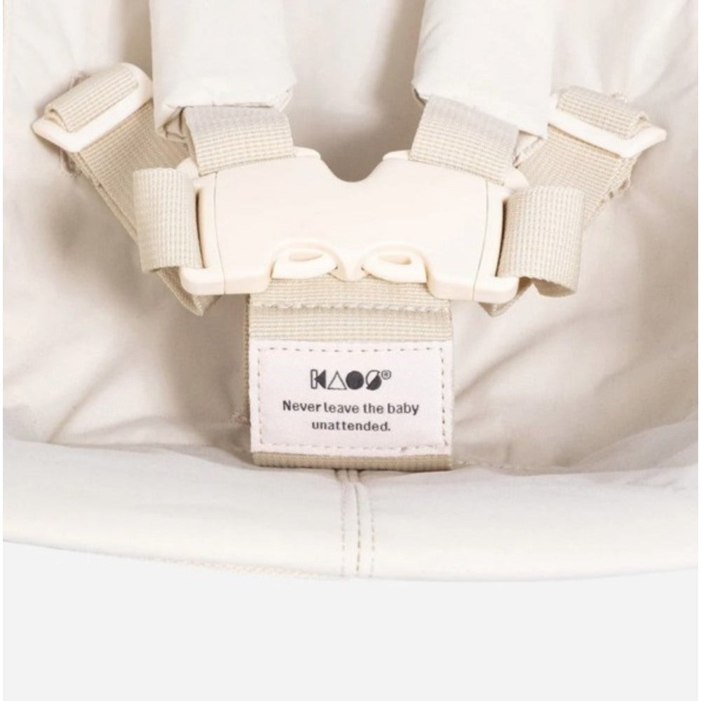 A Klapp Newborn Set baby carrier featuring a tag