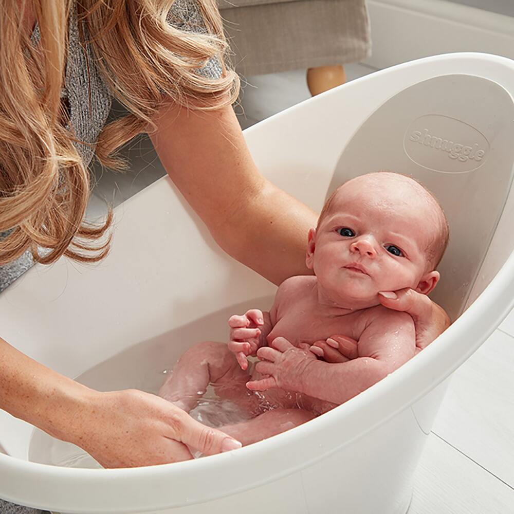 Shnuggle baby bath in white with baby having a bath