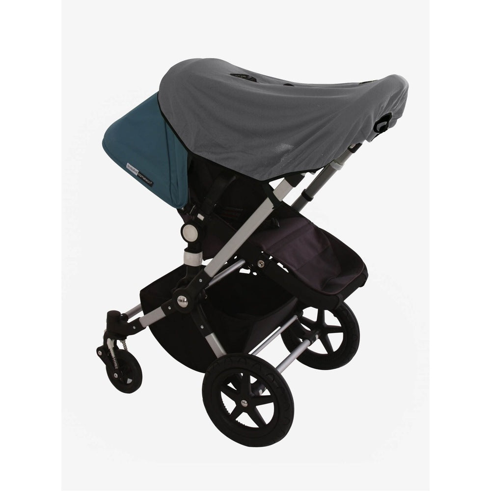 SnoozeShade attached to the handle of the pram