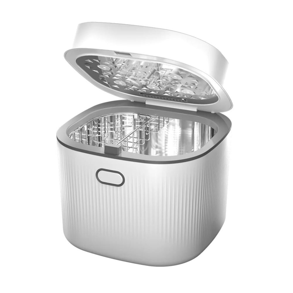 An open white Vital Baby Advanced Pro UV Steriliser & Dryer box with a silver lid.