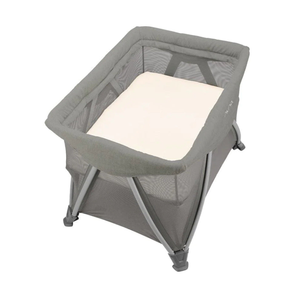 The Nuna Sena Aire in grey showing upper cot with white mattress